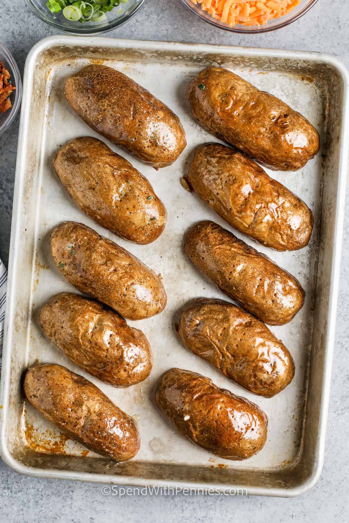 potatoes on a sheet pan to make Crispy Oven Baked Potato Skins