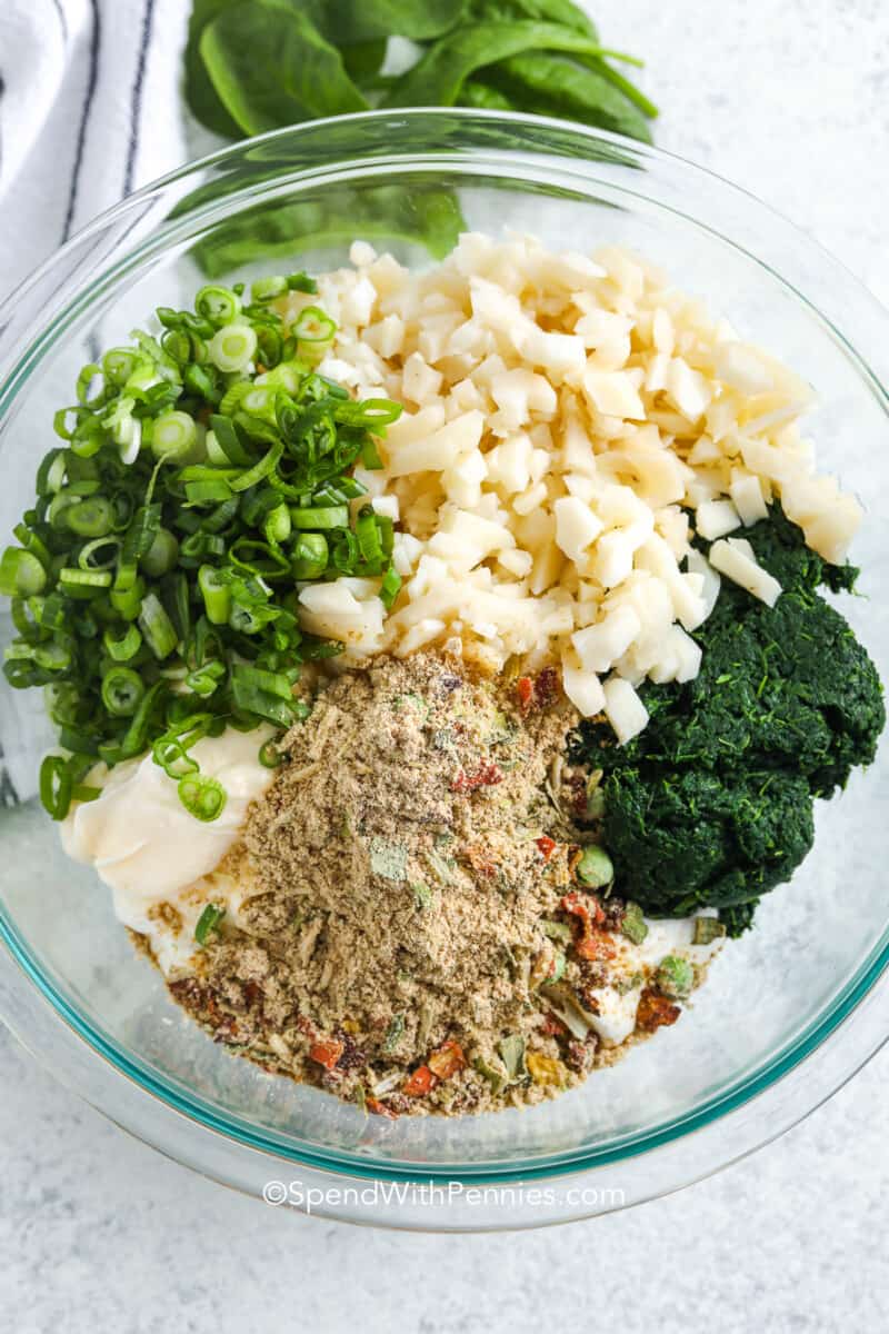 a bowl of ingredients for spinach dip