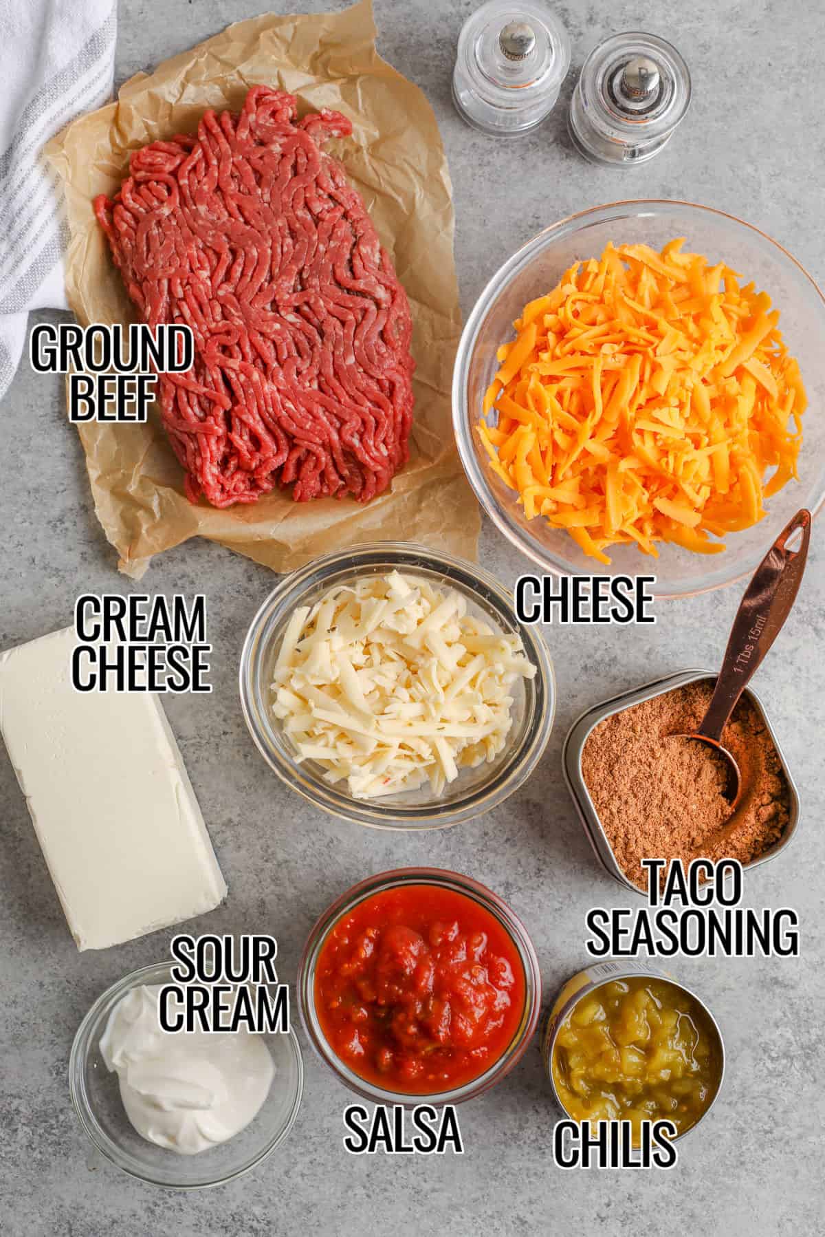 ingredients to make Hot & Cheesy Taco Dip with labels