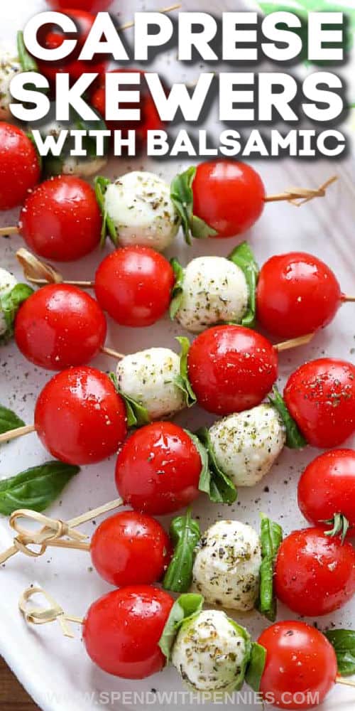 close up of Caprese Skewers with a title