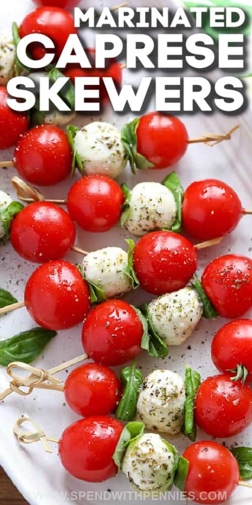 finished Caprese Skewers on a plate with writing