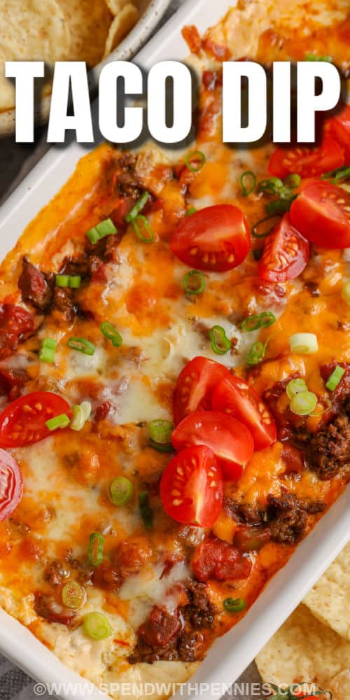 baked Hot & Cheesy Taco Dip in the dish with a title