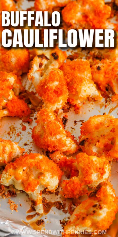 close up of Oven Baked Buffalo Cauliflower on a baking sheet and a title